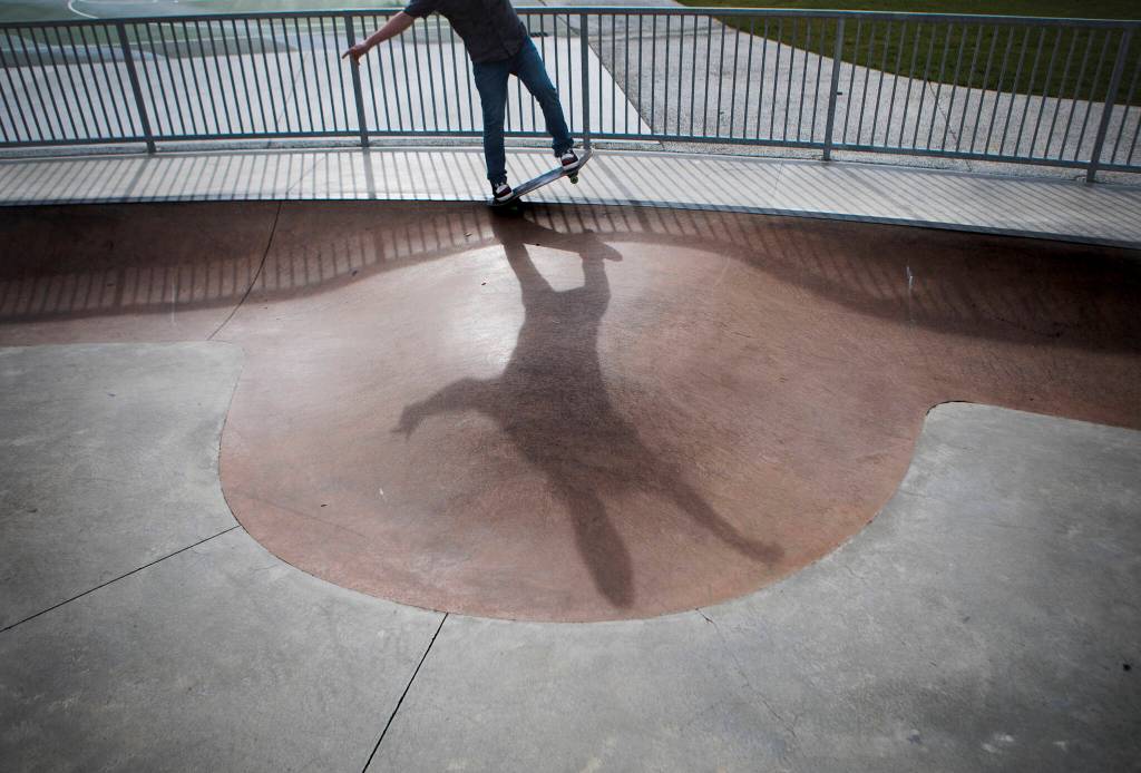 Hunter Lundeen works on a backside 5-0 trick on his skateboard at Cavalero Hill Skate Park on March 1 in Lake Stevens. (Olivia Vanni / The Herald)