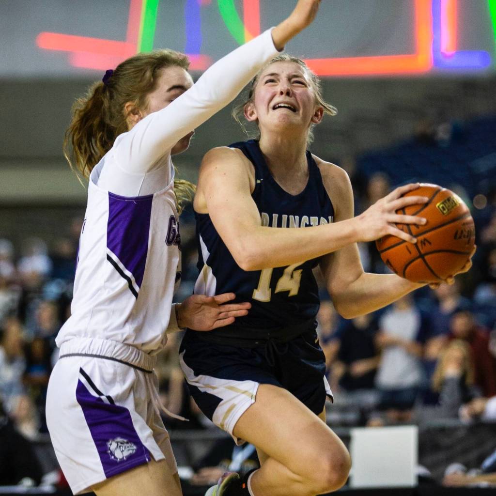 Arlington standout senior Keira Marsh drives to the hoop. (Olivia Vanni / The Herald)