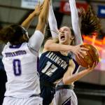 Arlington senior Hannah Rork draws a foul while attacking the basket. (Olivia Vanni / The Herald)