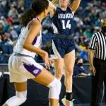 Arlingtons Keira Marsh takes a three-point shot during the 3A state semifinal against Garfield at the Tacoma Dome on Friday, March 4, 2022. (Olivia Vanni / The Herald)