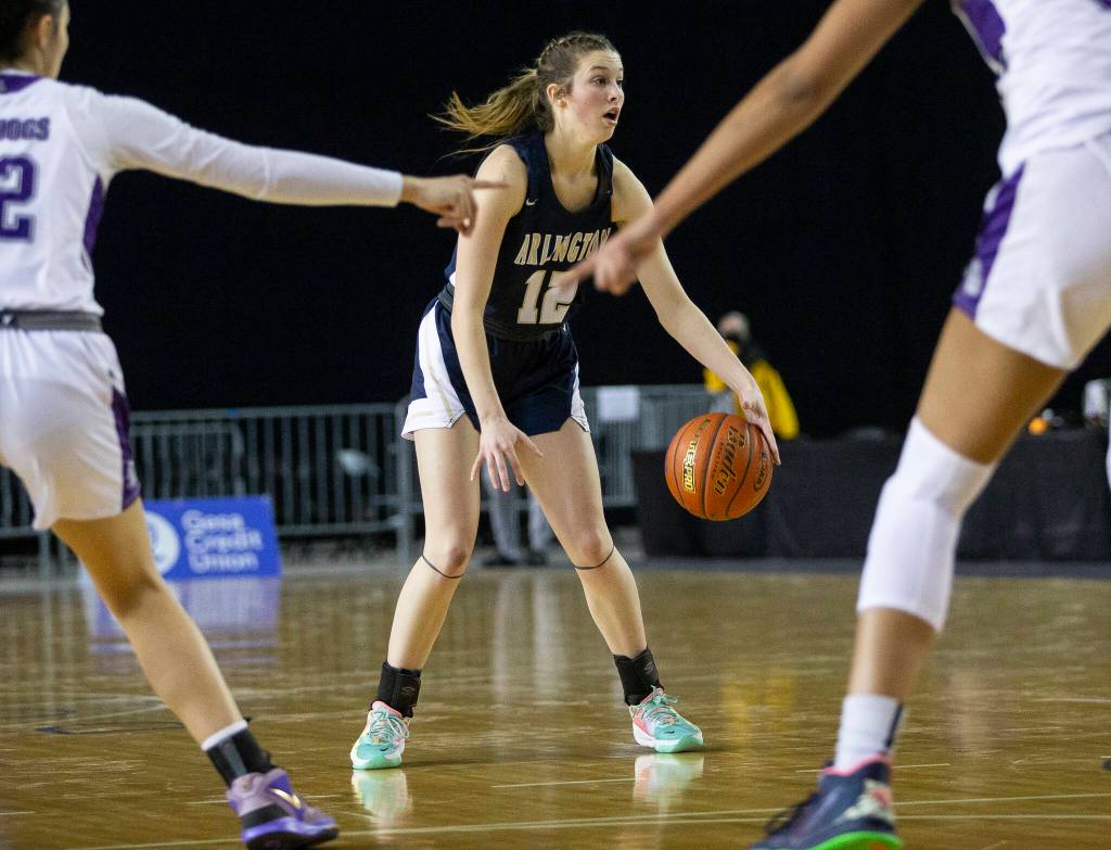 Arlingtons Hannah Rork calls out a play during the 3A state semifinal against Garfield at the Tacoma Dome on Friday, March 4, 2022. (Olivia Vanni / The Herald)