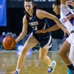 Arlingtons Jenna Villa drives to the hoop during the 3A state semifinal against Garfield at the Tacoma Dome on Friday, March 4, 2022. (Olivia Vanni / The Herald)