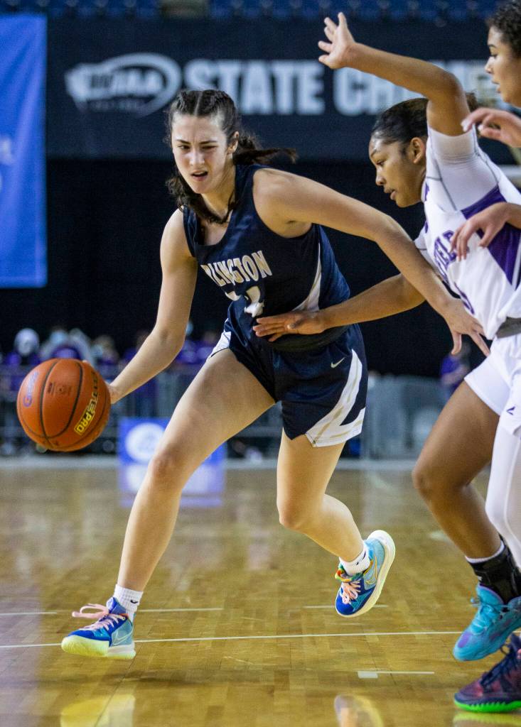 Arlingtons Jenna Villa drives to the hoop during the 3A state semifinal against Garfield at the Tacoma Dome on Friday, March 4, 2022. (Olivia Vanni / The Herald)