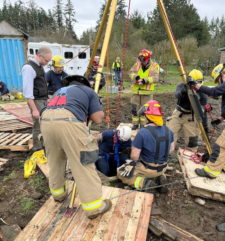 Responders are lowered into the well to sedate Blaze and secure him with straps from extraction. (Photo provided)