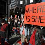 Dennis Willard, of Bellevue, carries a sign that reads Where Is She as he marches in support of missing and murdered indigenous women during a rally to mark Indigenous Peoples Day in downtown Seattle on Oct. 14, 2019. (AP Photo/Ted S. Warren, file)