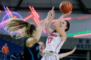 Snohomish's Ella Gallatin shoots over Bonney Lake's Brooke Mansfield Wednesday evening in Tacoma, Washington on March 2, 2022. The Panthers advance with the 46-44 victory over the Panthers. (Kevin Clark / The Herald)