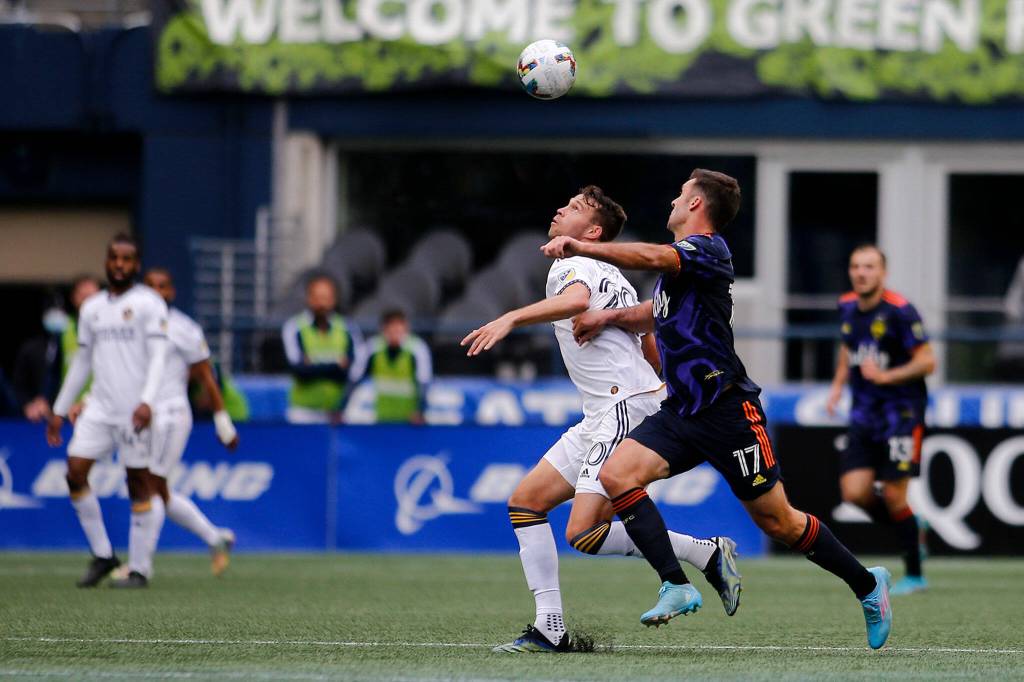 The Seattle Sounders Will Bruin tries to play tight defense in the finial moments of a game against the Los Angeles Galaxy Saturday, March 12, 2022, at Lumen Field in Seattle, Washington. (Ryan Berry / The Herald)