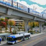 The 810 McCollum Park Community Transit bus at it's new stop in the shadow of the newly opened Northgate Light rail Station in Seattle. (Kevin Clark / The Herald)