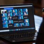 Other state representatives respond to roll call over a virtual meeting before their swearing in on Friday, Jan. 8, 2020 in Everett, Wa. (Olivia Vanni / The Herald)