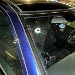 This photo shows the gunshot through a car's windshield that struck a 36-year-old man in the shoulder, according to police. (Lynnwood Police Department)