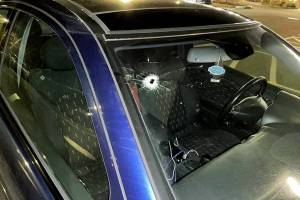 This photo shows the gunshot through a car's windshield that struck a 36-year-old man in the shoulder, according to police. (Lynnwood Police Department)