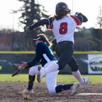 Snohomishs Bridget Johnson leaps to try and beat the ball to first base during the game against Glacier Peak on Wednesday, March 16, 2022 in Snohomish, Washington. (Olivia Vanni / The Herald)