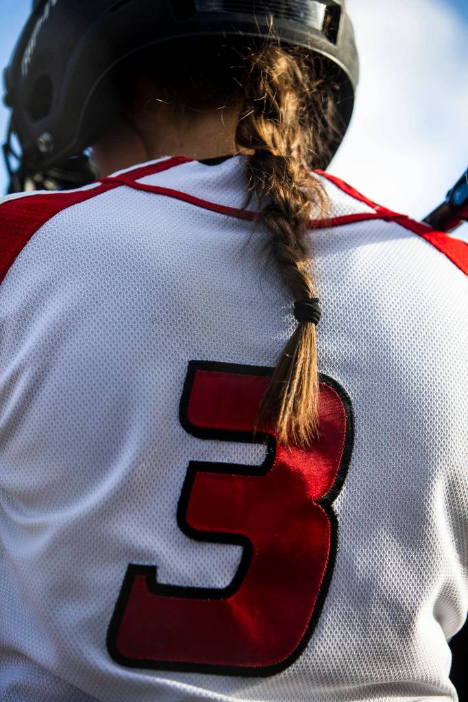 Snohomishs Kendel Sage warms up in the on deck circle during the game against Glacier Peak on Wednesday, March 16, 2022 in Snohomish, Washington. (Olivia Vanni / The Herald)
