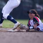 Snohomishs Emma Hansen dives to try and beat the runner to second base during the game against Glacier Peak on Wednesday, March 16, 2022 in Snohomish, Washington. (Olivia Vanni / The Herald)