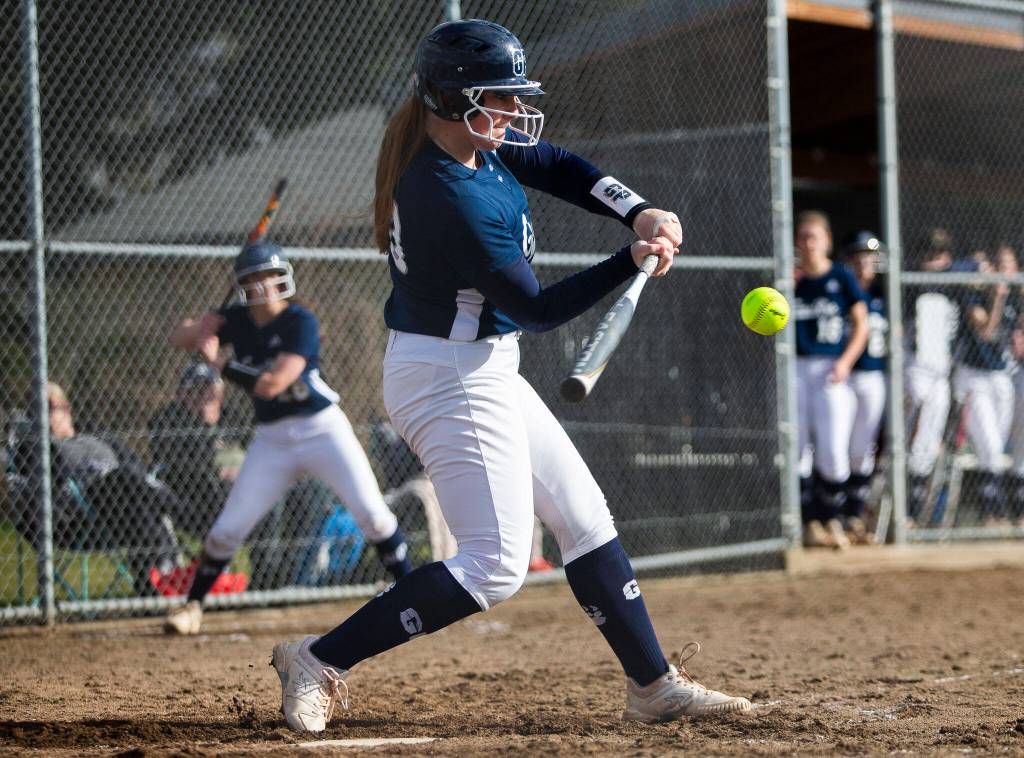 Glacier Peaks Brynna Farman hits the ball during the game against Snohomish on Wednesday, March 16, 2022 in Snohomish, Washington. (Olivia Vanni / The Herald)