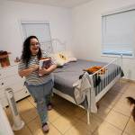 Krystal Guerra, 32, begins packing her belongings after her new landlord gave her less than a months notice that her rent would go up 26 percent, Feb. 12, in the Coral Way neighborhood of Miami. Guerra, who works in marketing while pursuing a degree, had already been spending nearly 50 percent of her monthly income on rent prior to the increase. Unable to afford a comparable apartment in the area as rents throughout the city have risen dramatically, Guerra is putting many of her belongings into storage and moving in with her boyfriend and his daughter. (Rebecca Blackwell / Associated Press)
