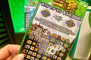 Eight of the Washington Lottery’s “luckiest retailers” are right here in Snohomish County. On the $5 scratch ticket "Triple Fortune Dragon Spitfire," the odds are 1 in 3.31 of winning a prize in 11 amounts from $5 to $50,000 on the 6.6 million tickets printed. At this writing, six of the 12 prizes of $50,000 have not been claimed. (Andrea Brown / The Herald)