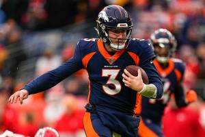 Denver Broncos quarterback Drew Lock (3) runs for a touchdown against the Kansas City Chiefs during an NFL football game Saturday, Jan. 8, 2022, in Denver. (AP Photo/Jack Dempsey)
