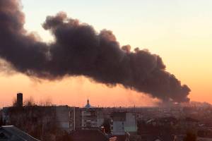 FILE - A cloud of smoke rises after an explosion in Lviv, western Ukraine, March 18, 2022. Until the missiles struck within walking distance of the cathedrals and cafes downtown, Ukraine’s cultural capital was a city that could feel distant from the war. (AP Photo, File)