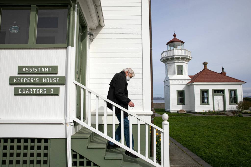 Peter Anderson walks around the Mukilteo Lighthouse campus Thursday. (Ryan Berry / The Herald)