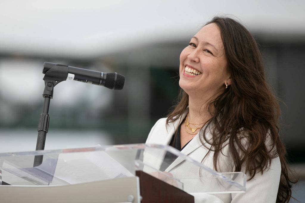 Rep. Davina Duerr smiles while addressing a crowd. (Ryan Berry / The Herald)