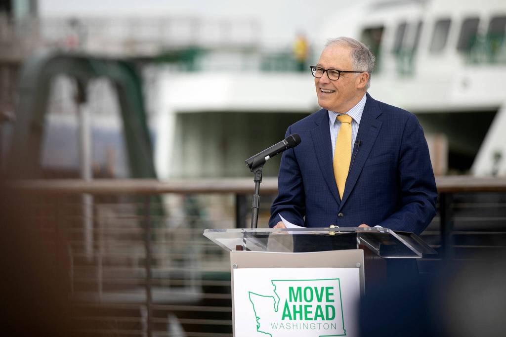 Gov. Jay Inslee speaks about multiple bills during the bill signing. (Ryan Berry / The Herald)