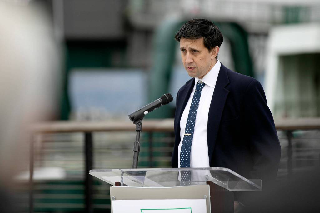 Rep. Alex Ramel speaks during the bill signing. (Ryan Berry / The Herald)
