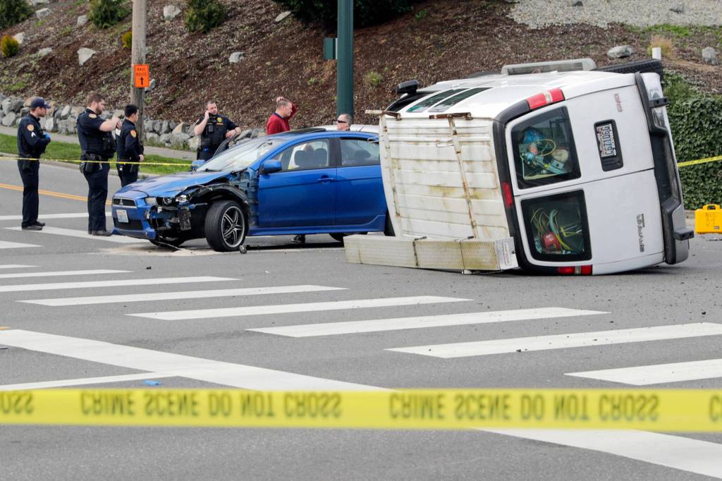 No one was reported injured in the three-vehicle collision. (Kevin Clark / The Herald)