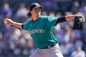 Seattle Mariners starting pitcher Logan Gilbert throws during the first inning of a baseball game against the Kansas City Royals Sunday, Sept. 19, 2021, in Kansas City, Mo. (AP Photo/Charlie Riedel)
