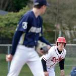 Arlingtons Ty Rusko, left, tracks Snohomishs Solomon Heineman Friday afternoon at Snohomish High School. The Eagles won 4-2. (Kevin Clark / The Herald)