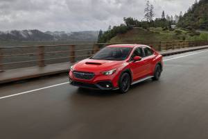 The 2022 Subaru WRX has a widened hexagonal grille, compact LED headlights, and a broad hood scoop. (Manufacturer photo)