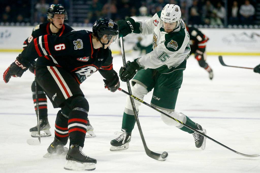 The Everett Silvertips Ryan Hofer puts a shot on net against the Portland Winterhawks Saturday, March 26, 2022, at Angel of the Winds Arena in Everett, Washington. (Ryan Berry / The Herald)