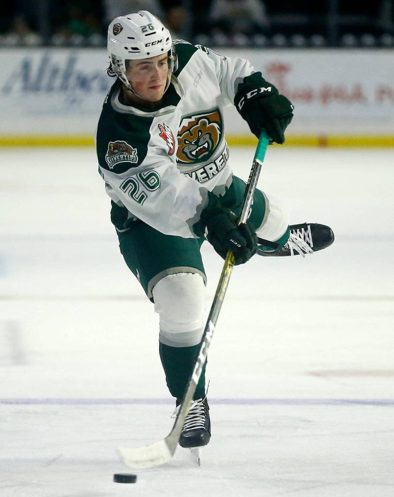 The Everett Silvertips Johnny Lambos launches a shot towards the net against the Portland Winterhawks Saturday, March 26, 2022, at Angel of the Winds Arena in Everett, Washington. (Ryan Berry / The Herald)