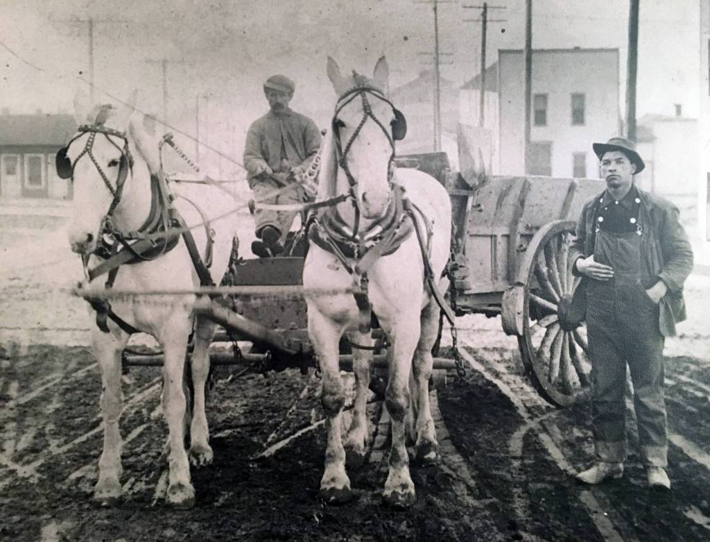 Henry Rubatino standing next to his horse and wagon, date unknown. (Rubatino family photo)