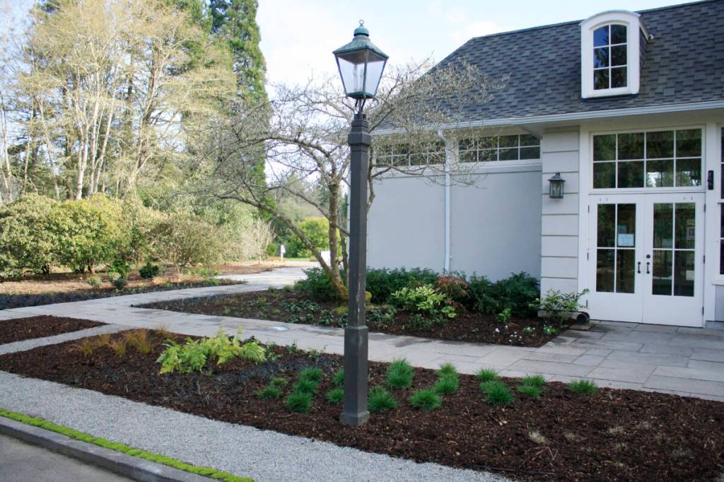 Visitors are guided toward the trail head as they meander through an accessible, 1,700-square-foot plaza, with mixed planting beds showcasing some of the different landscapes theyll see on the grounds. Etta Lilienthal photo