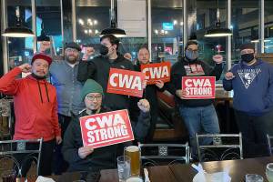 Workers from Lynnwood and Everett Verizon stores gather at an Everett restaurant on March 6, one day before they announced plans to unionize. (Contributed)