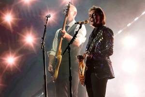 Brandi Carlile performs "Right on Time" at the 64th Annual Grammy Awards on Sunday, April 3, 2022, in Las Vegas. (AP Photo/Chris Pizzello)