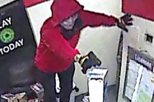 A suspect in the killing of Nagendiram Kandasamy was caught on a surveillance camera during the armed robbery of a 7-Eleven store in Edmonds on Feb. 21, 2020. (Edmonds Police Department)