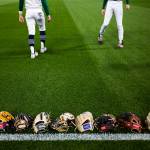 Edmonds-Woodway players warm up before the game against Kentwood at T-Mobile Park on Friday, April 8, 2022 in Seattle, Washington. (Olivia Vanni / The Herald)
