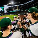 Edmonds-Woodway players cheer before heading out onto the field at T-Mobile Park on Friday, April 8, 2022 in Seattle, Washington. (Olivia Vanni / The Herald)