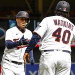 Minnesota Twins' Carlos Correa (4) rounds third base on a solo home run against the Seattle Mariners during the sixth inning of a baseball game, Sunday, April 10, 2022, in Minneapolis. (AP Photo/Nicole Neri)
