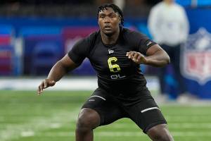 Mississippi State offensive lineman Charles Cross runs a drill during the NFL football scouting combine, Friday, March 4, 2022, in Indianapolis. (AP Photo/Darron Cummings)