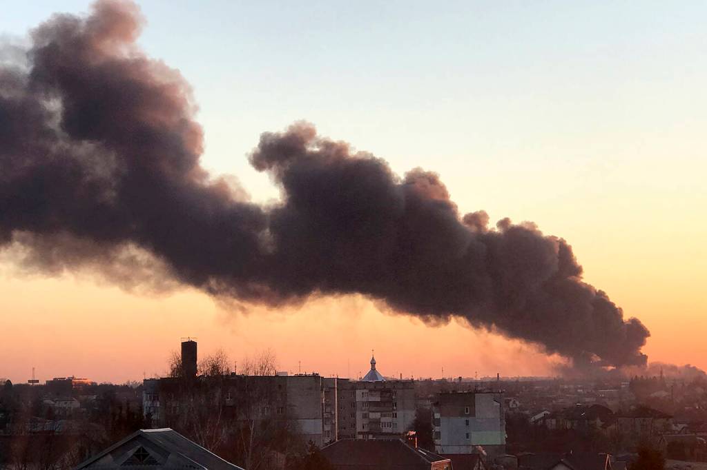A cloud of smoke rises after an explosion in Lviv, western Ukraine, on March 18. (AP Photo, File)