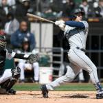 The Mariners Jarred Kelenic watches his two-run home run during the second inning of a game against the White Sox on Thursday in Chicago. (AP Photo/Paul Beaty)