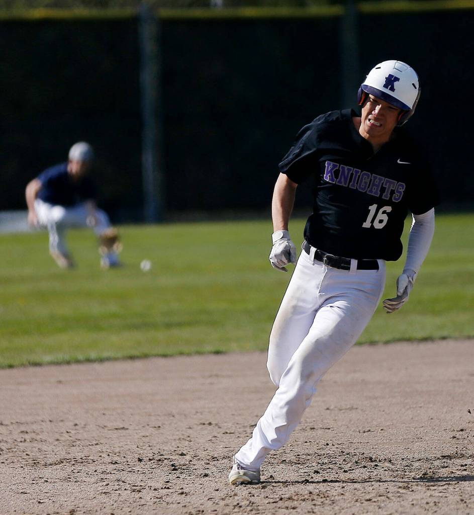 Kamiaks Sanha Oh rounds third on his way to scoring the first run of the game against Glacier Peak Friday, April 15, 2022, at Kamiak High School in Mukilteo, Washington. (Ryan Berry / The Herald)