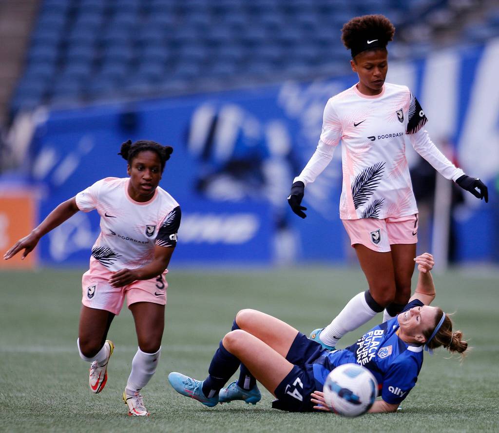 OL Reigns Veronica Latsko hits the ground as play continues during a NWSL Challenge Cup matchup against Angel City FC Sunday, April 17, 2022, at Lumen Field in Seattle, Washington. (Ryan Berry / The Herald)