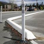 The curb median keeps vehicles from the shoulder on the south side of 20th Street SE in Lake Stevens. (Kevin Clark / The Herald)