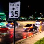 Drivers head northbound on Evergreen Way through the Everett Mall Way intersection past a 35 mph speed limit sign on Wednesday, April 20, 2022 in Everett, Washington. (Olivia Vanni / The Herald)