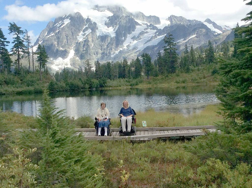 Denise Smith-Irwin and Toni Lynch, two contributing members to the wheelchair-friendly filter project, pose on the Picture Lake Trail. (Courtesy Toni Lynch and Denise Smith-Irwin)