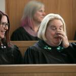 Judges laugh and cry while listening to a speaker during the memorial for Judge Cassandra Lopez-Shaw Thursday at the Snohomish County Courthouse in Everett. (Ryan Berry / The Herald)